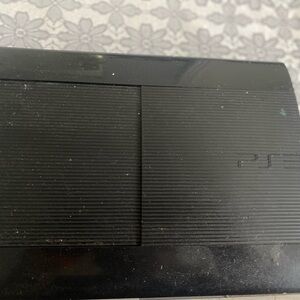 PS3, no controller, includes GTA V. Shows some age, but works flawlessly.
